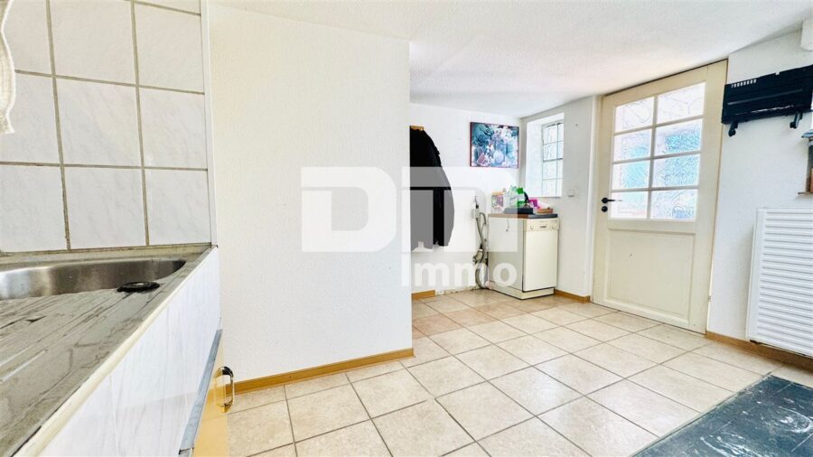 Sanierte Doppelhaushälfte mit großzügigem Garten, Garage & viel Platz für die Familie - Souterrain Waschküche 1 / Zugang Gartenbereich